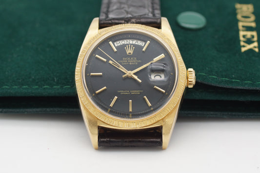 Rolex Day-Date 36 1807 Schwarz 18K Gelbgold 1970 Borkenlunette